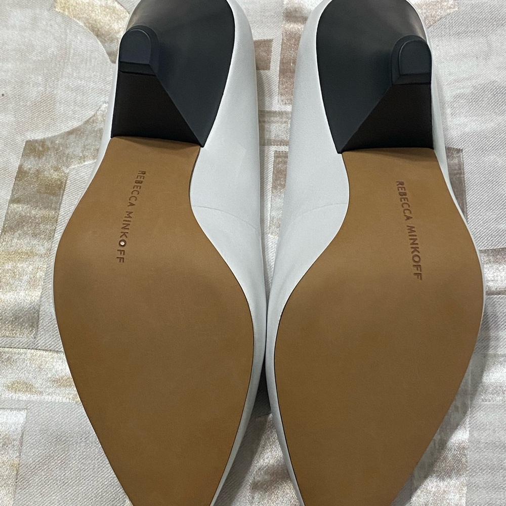 White and black Rebecca Minkoff heels never warn